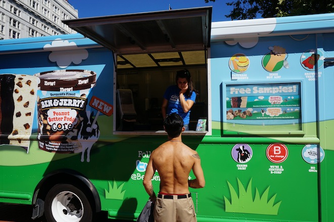Shirtless guy getting free ice cream. Why not?